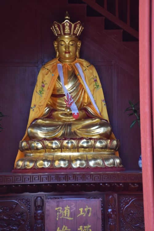 Garbinimas, Budistinis, Religija, Statula